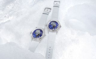 Two MB&F watches lying in snow. LM Flying T Ice and LM Flying T Blizzard