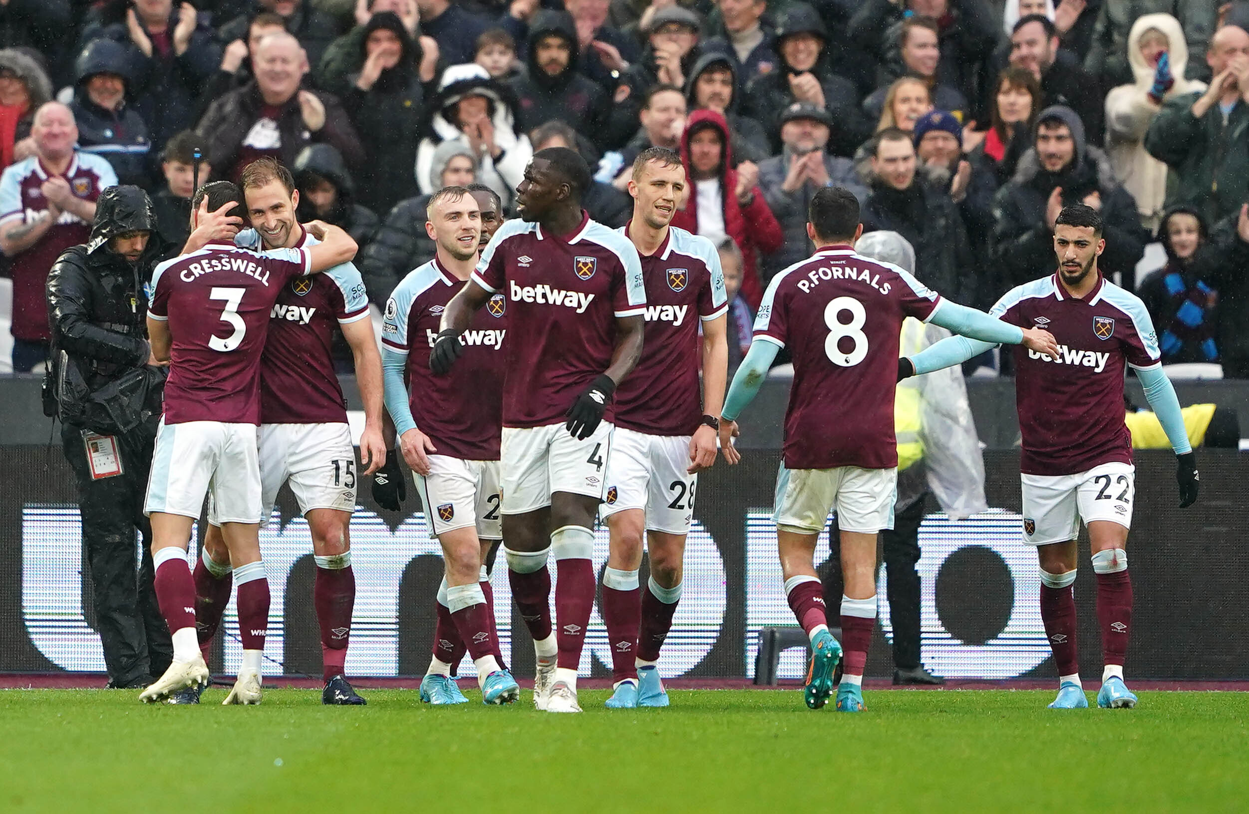 Craig Dawson, second left, celebrates after scoring the opening goal