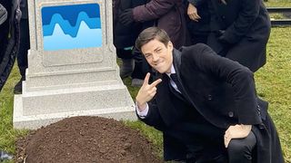 Grant Gustin grave kneeling meme but with the Windows 11 Task Manager icon on the gravestone