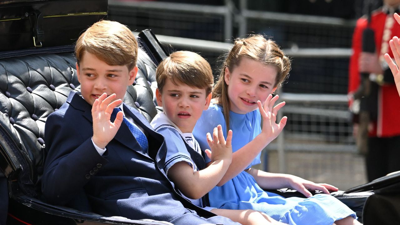 Prince George, Princess Charlotte and Prince Louis wave during Trooping the Colour