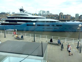 Joe Lewis's yacht Aviva outside the Blueprint Cafe, London