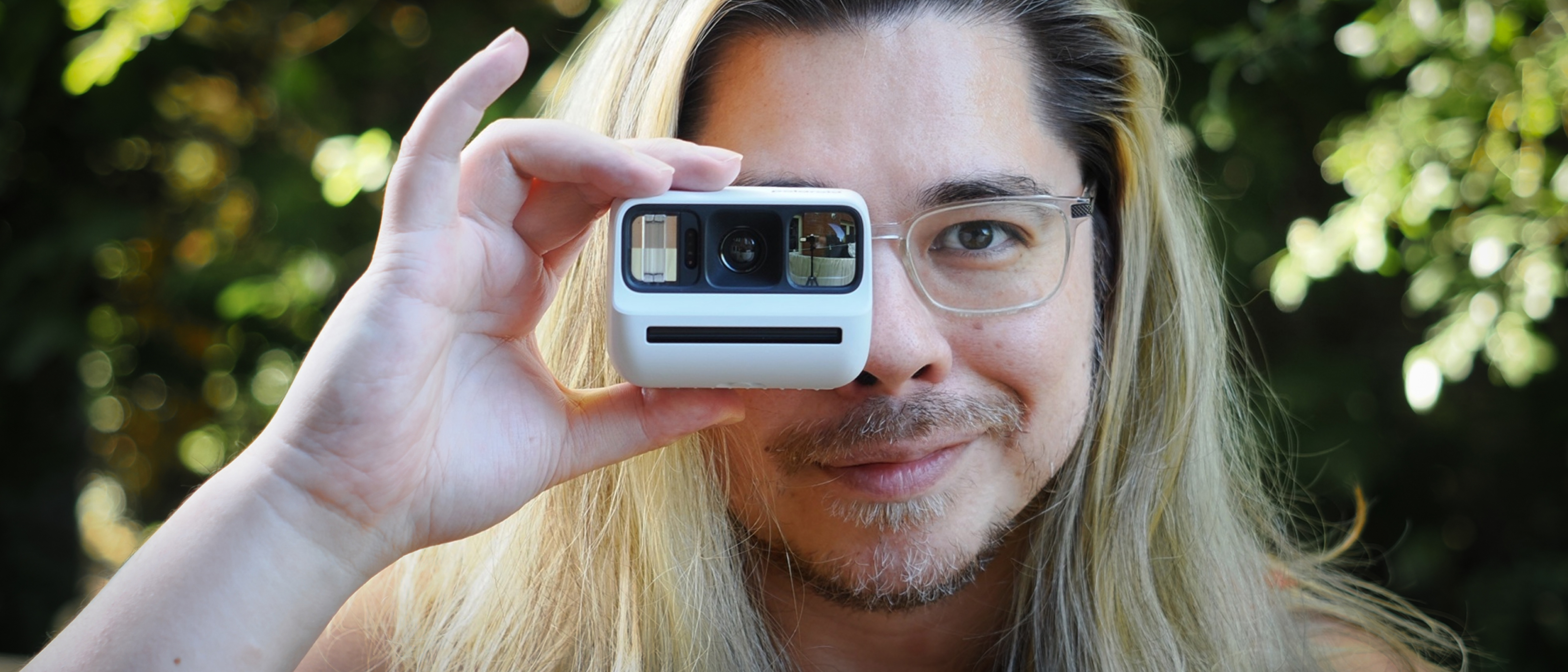Polaroid Go Gen 3 on a wooden surface outdoors