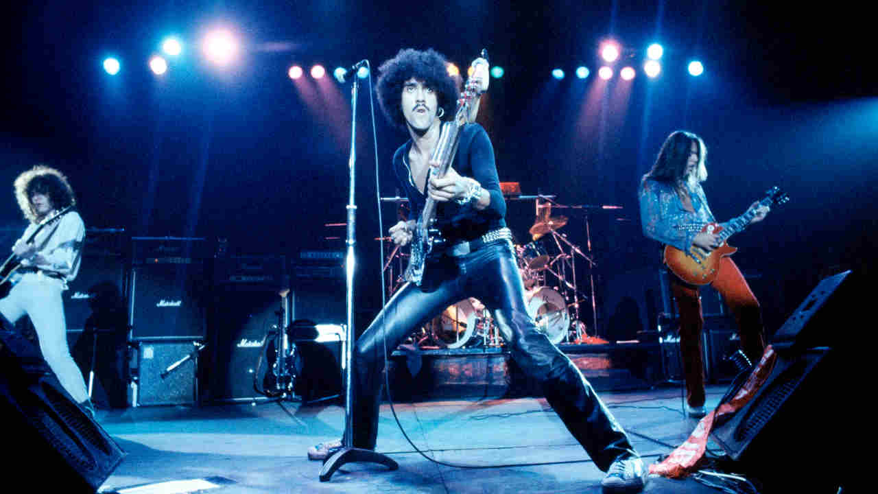 Thin Lizzy performing onstage in the 1970s