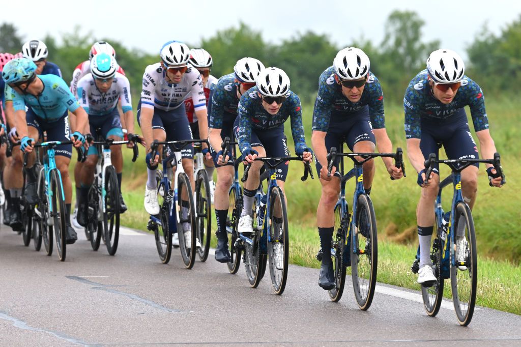 COLOMBEYLESDEUXEGLISES FRANCE JULY 06 LR Jonas Vingegaard Hansen of Denmark Tiesj Benoot of Belgium and Team Visma Lease a Bike compete during the 111th Tour de France 2024 Stage 8 a 1834km stage from SemurenAuxois to ColombeylesDeuxEglises 352m UCIWT on July 06 2024 in ColombeylesDeuxEglises France Photo by Dario BelingheriGetty Images