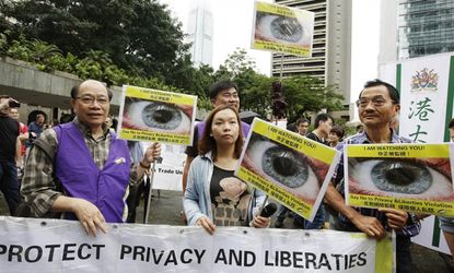 Edward Snowden supporters protest in Hong Kong on June 15.