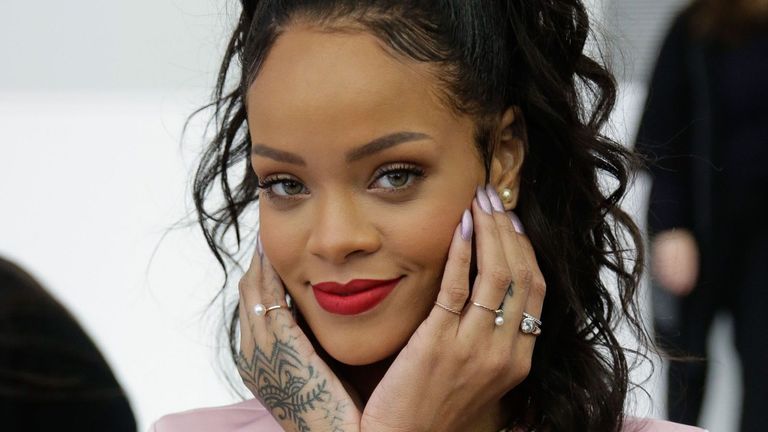 Finger, Hairstyle, Skin, Earrings, Hand, Wrist, Fashion accessory, Eyelash, Style, Body jewelry,