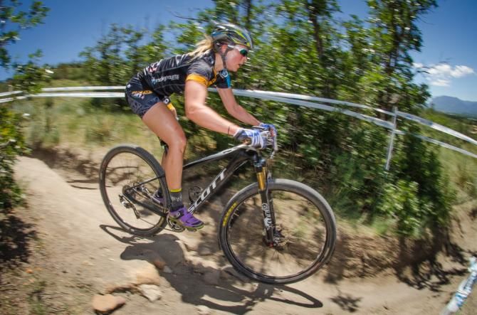 Erin Huck (Tokyo Joe's) takes a descent during the opening lap of the elite women's race. Huck went on to take sixth place in both the race and the overall standings.