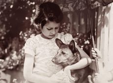 Young Princess Elizabeth (c1938) with her pet corgi.