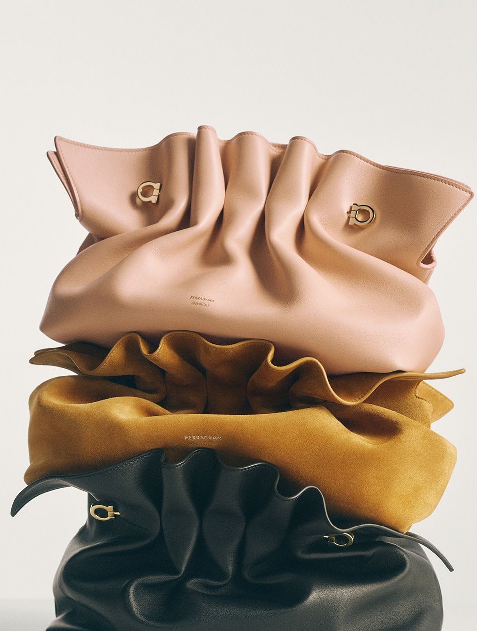 A selection of Ferragamo's new Soft-Bags stacked upon one another.