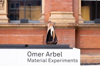 Sculpture of metal and glass by Omer Arbel for show 'Material Experiments' at the V&A