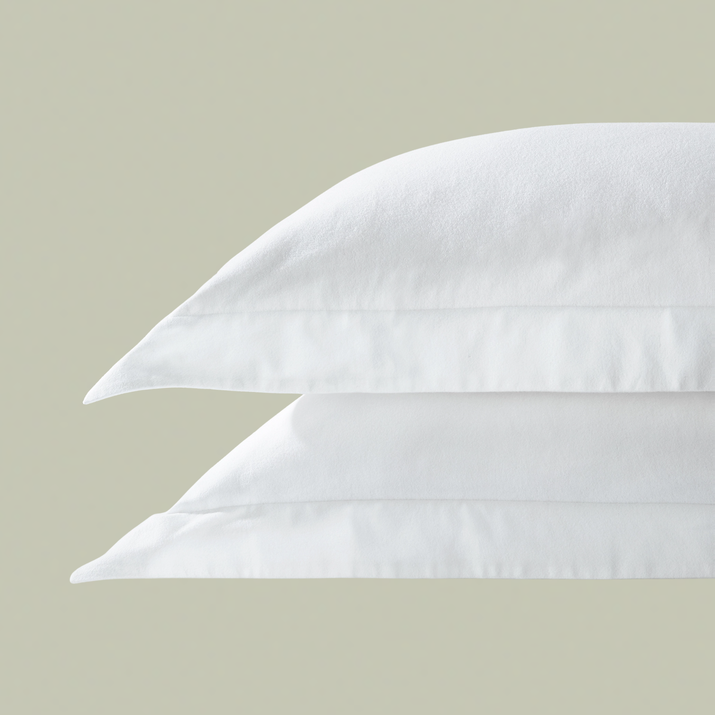 A pair of white brushed cotton oxford pillowcases