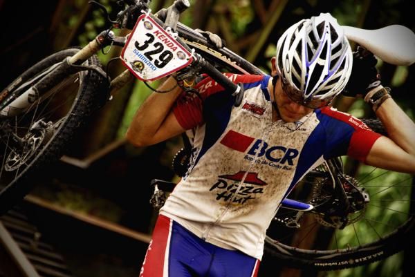 Federico Ramirez crosses a railroad bridge