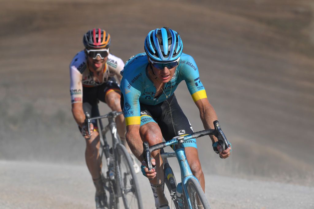 SIENA ITALY AUGUST 01 Jakob Fuglsang of Denmark and Astana Pro Team Maximilian Schachmann of Germany and Team BoraHansgrohe Dust Gravel Strokes during the Eroica 14th Strade Bianche 2020 Men a 184km race from Siena to SienaPiazza del Campo StradeBianche on August 01 2020 in Siena Italy Photo by Tim de WaeleGetty Images