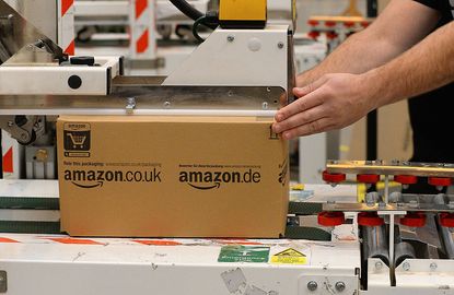 An Amazon box is prepared for shipment
