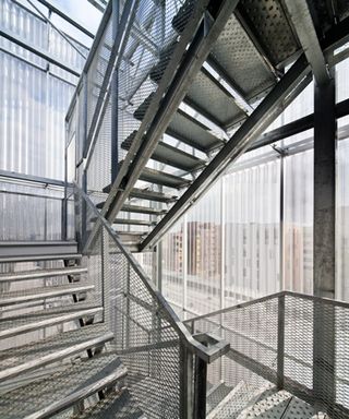A bright area where metal stairwell is situated.