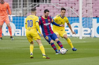 Barcelona’s Lionel Messi (centre) made a record 506th LaLiga appearance for the club against Cadiz