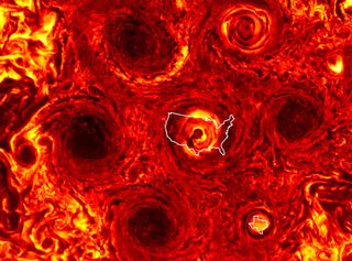 An outline of the continental United States superimposed over the central cyclone and an outline of Texas is superimposed over the newest cyclone at Jupiter's south pole give a sense of their immense scale. The hexagonal arrangement of the cyclones is large enough to dwarf the Earth.