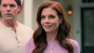 JoAnna Garcia Swisher smiles at something off screen