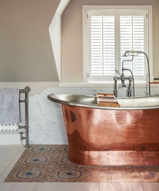 Bathroom ideas with brass bath