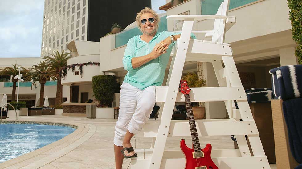 Sammy Hagar poolside with guitar