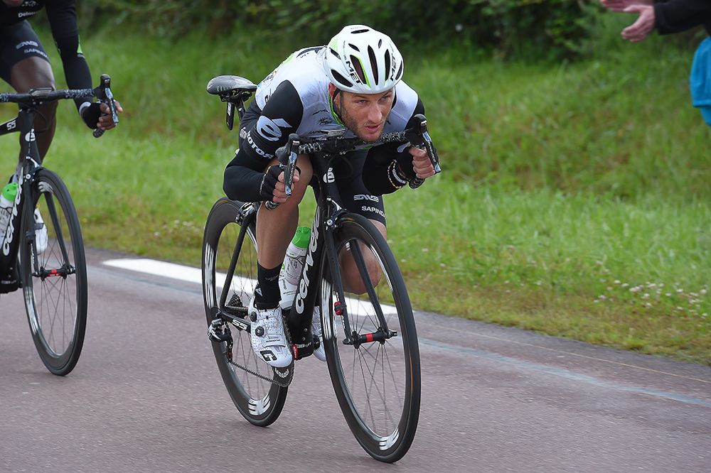 Steve Cummings tucks during a downhill section of stage 2