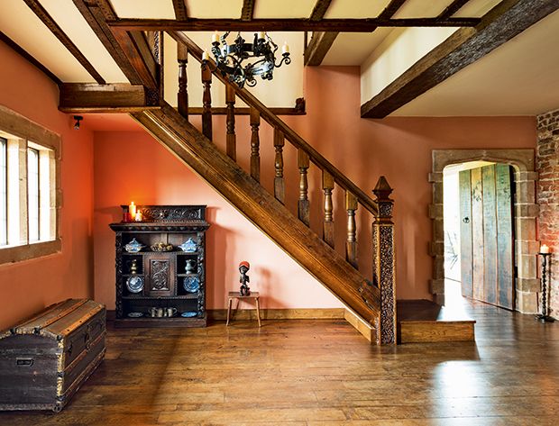 interior of tudor style house with wooden staircase