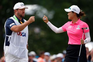 Minjee Lee of Australia celebrates with her caddie Brad Beecher on the first green during the final round of the U.S. Women's Open Presented by Ally at Lancaster Country Club on June 02, 2024 in Lancaster, Pennsylvania.