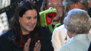 The Queen is introduced to Ozzy Osbourne and Kermit the Frog on stage during "Party at the Palace" in London 03 June 2002 as part of Queen Elizabeth's Golden Jubilee celebrations.