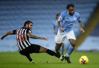Raheem Sterling playing for Manchester City