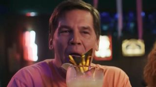 Josh Brolin's character attempting to enjoy a mixed drink