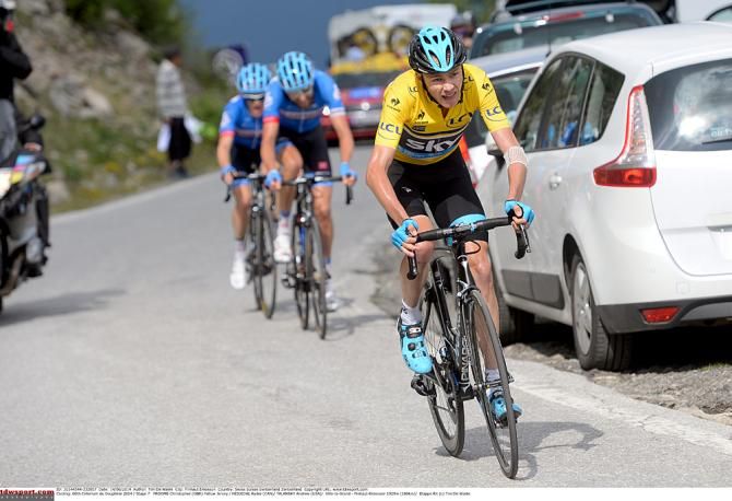 Chris Froome (Team Sky) tries to close the gap to Contador on the final climb