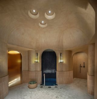 An Arabian luxury spa center has interiors where traditional architecture and contemporary design come to the fore in ceramic-drenched dome-like volumes.