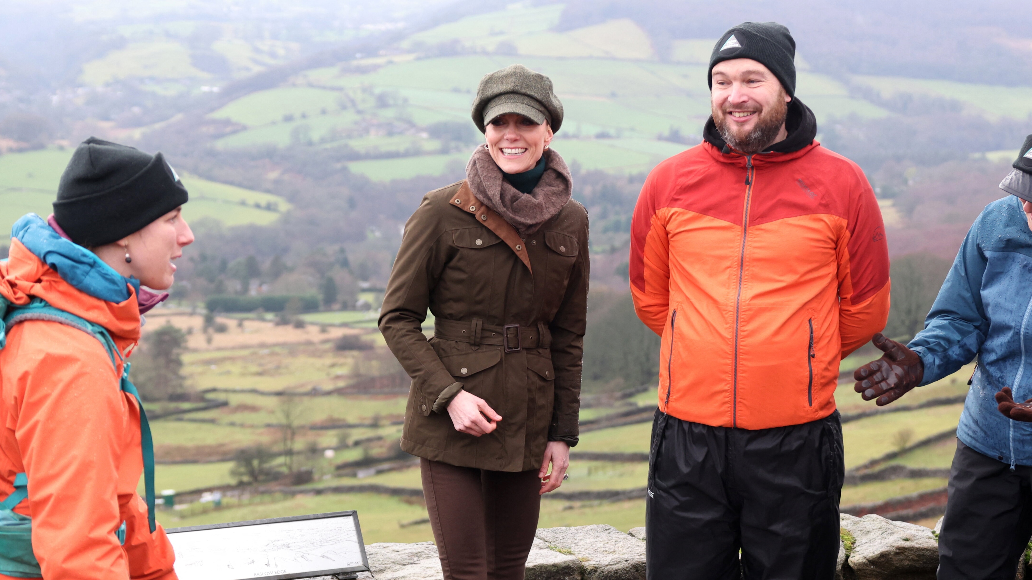 Catherine, Princess of Wales, reacts during a guided walk in the Peak District with members of the Mind Over Mountains charity