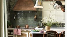 House of Hackney's kitchen with green tiles and marble work space 