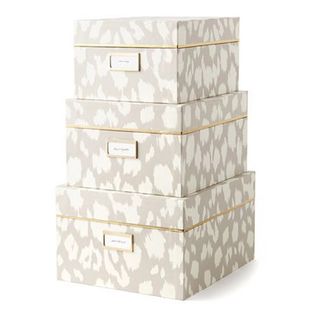 Three Kate Spade New York Ikat Storage Boxes stacked on top of each other