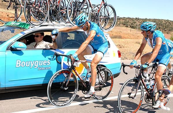 Two Bouygues riders work on their tans