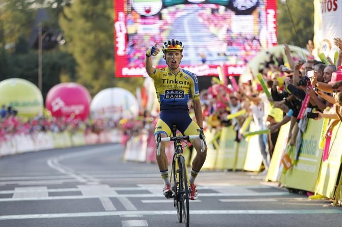 Rafal Majka (Tinkoff - Saxo) gives his victory salute after a stage 6 win