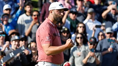 Jon Rahm celebrates after winning the 2023 Genesis Invitational