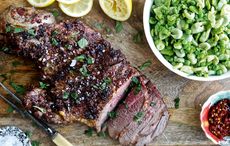 Mushy broad beans with spicy butterflied leg of lamb