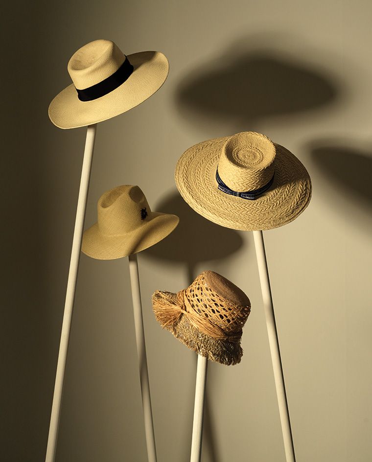 Left to right, Straw hat by Celine by Hedi Slimane. Straw hat by Vilebrequin, Panama hat by Hermés, Raffia hat by Dior