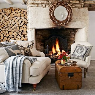 room with fireplace and sofaset with cushions