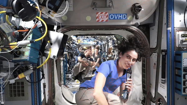 Tuck and roll! Watch ISS astronauts have fun during orbit-raising thruster fire (video) Space