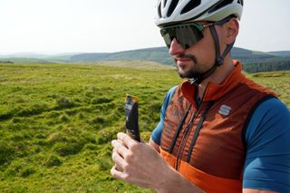 Stefan about to have one of STYRKR's Gel30 energy gel while on the Trans Cambrian Way
