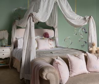 A four poster bed for a child
