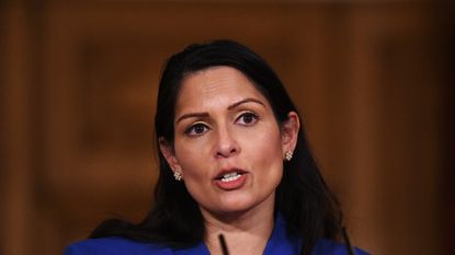 LONDON, ENGLAND - JANUARY 12: United Kingdom Home Secretary Priti Patel talks at a coronavirus press conference at Downing Street on January 12, 2021 in London, England. The Home Secretary pressed the message that the nation must abide by the government's rules to help get Covid-19 cases down again, following days of the numbers increasing. (Photo by Leon Neal/Getty Images)