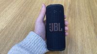 Hands on image of the JBL Grip Bluetooth speaker