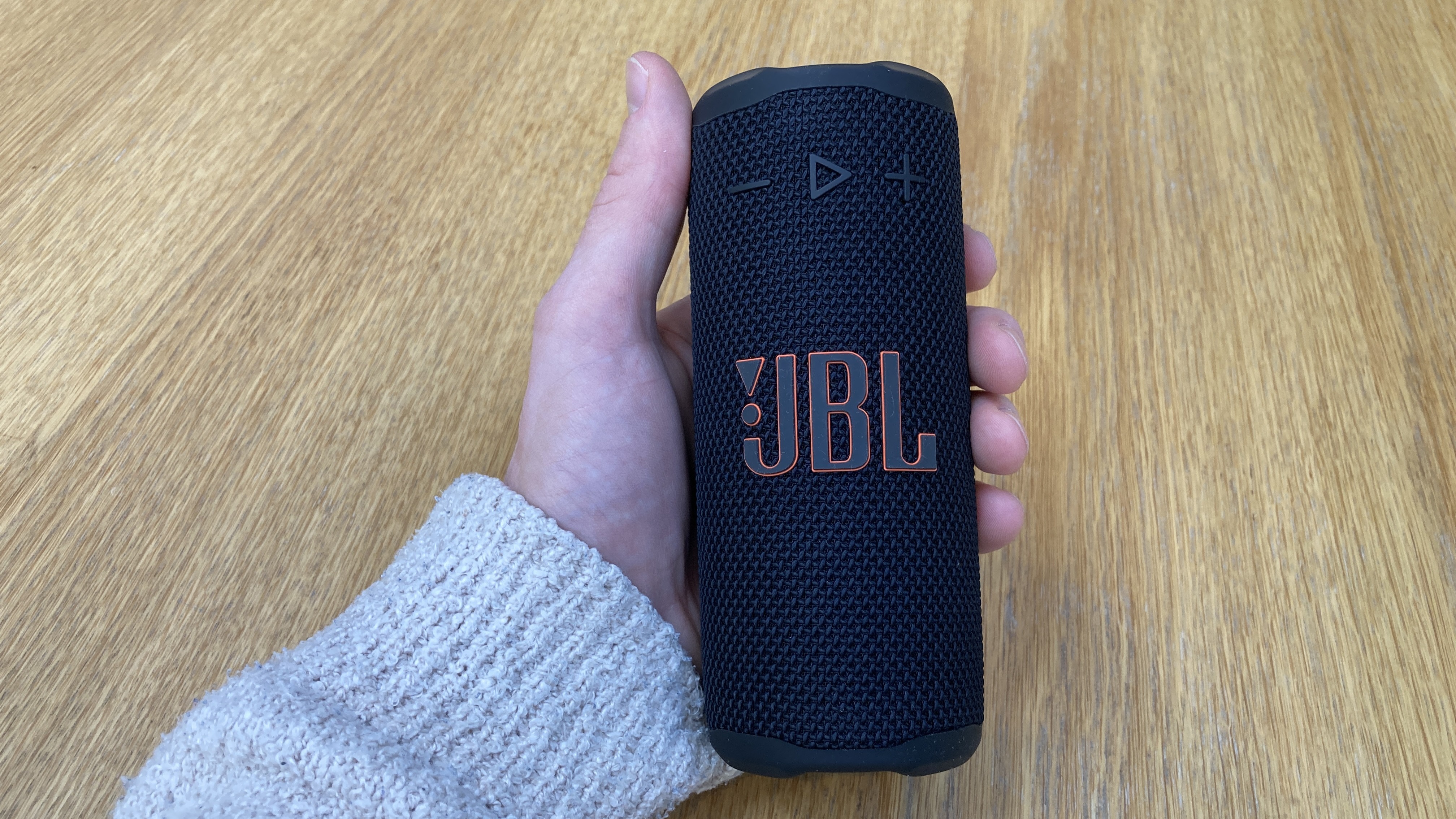 Hands on image of the JBL Grip Bluetooth speaker