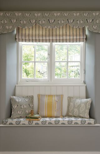 Window seat in bedroom by Vanessa Arbuthnott