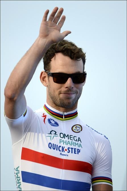 Mark Cavendish smiles and waves