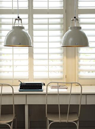 home office with shutter blinds and pendant lighting by original btc